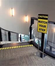 caution watch your step sign