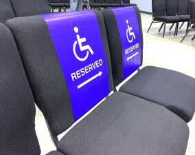 custom ADA signage for reserved handicap seats