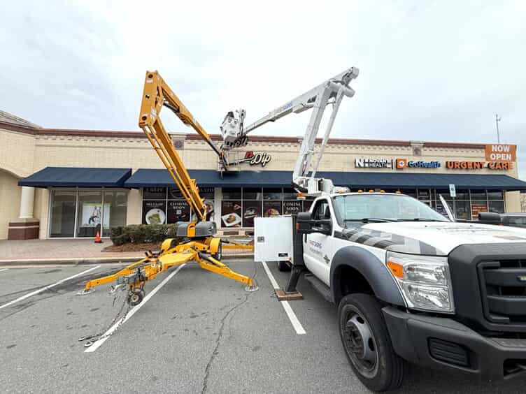 An image of a sign being installed.