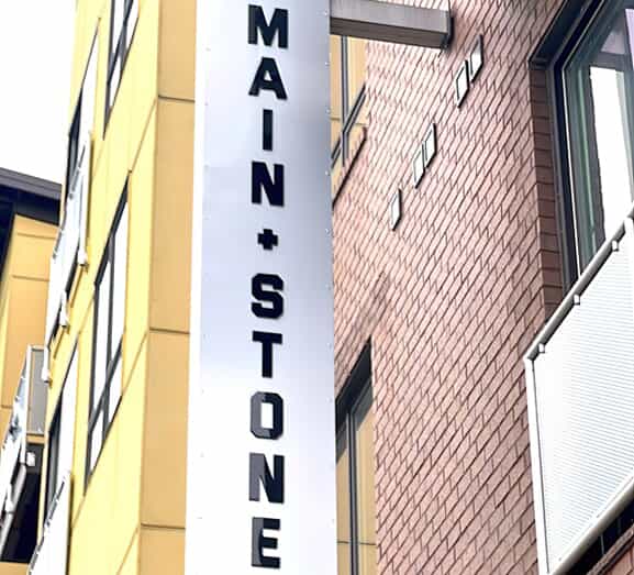 An image of outdoor Main Stone signage.