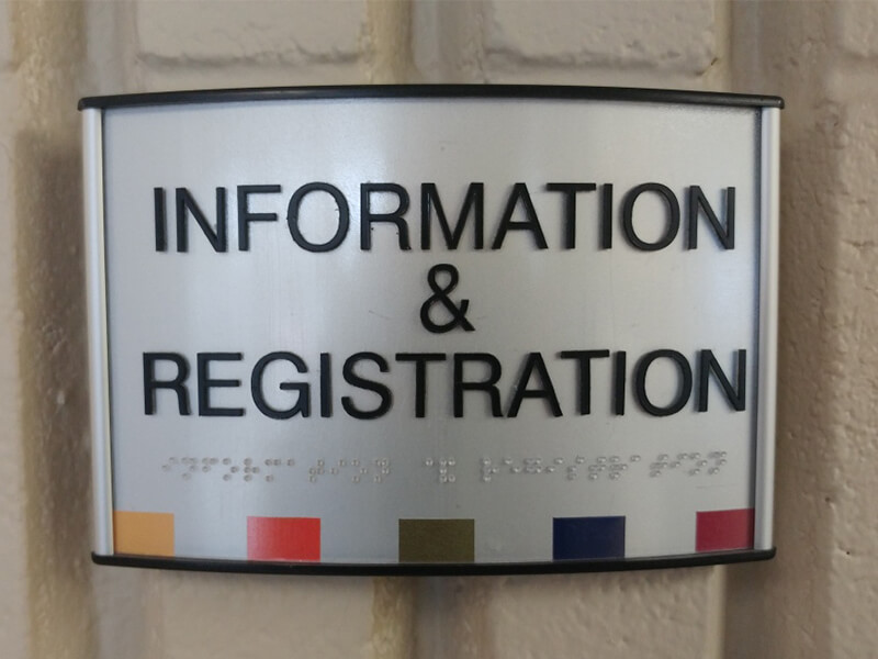 Wayfinding sign for information and registration