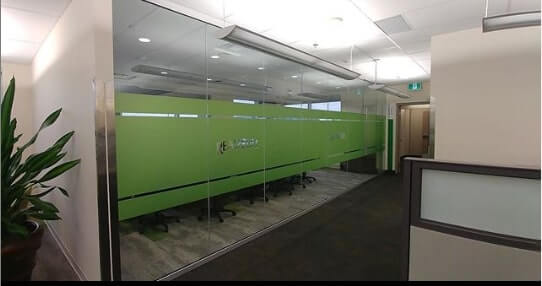 Glass window wrapped with vinyl on the hallway