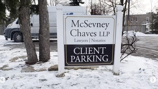 Mcsevney Chaves LLP monument sign on the snow