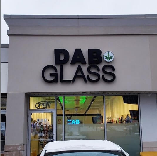 Dab glass dimensional signage on the building