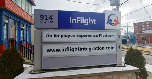 Inflight monument signage outside the building