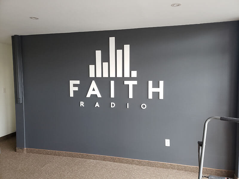 Faith radio signage  on the wall