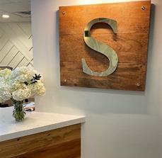 The social logo on the wall