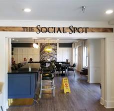 The social spot signage with wood on the hallway
