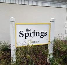 The spring social signage outside the building