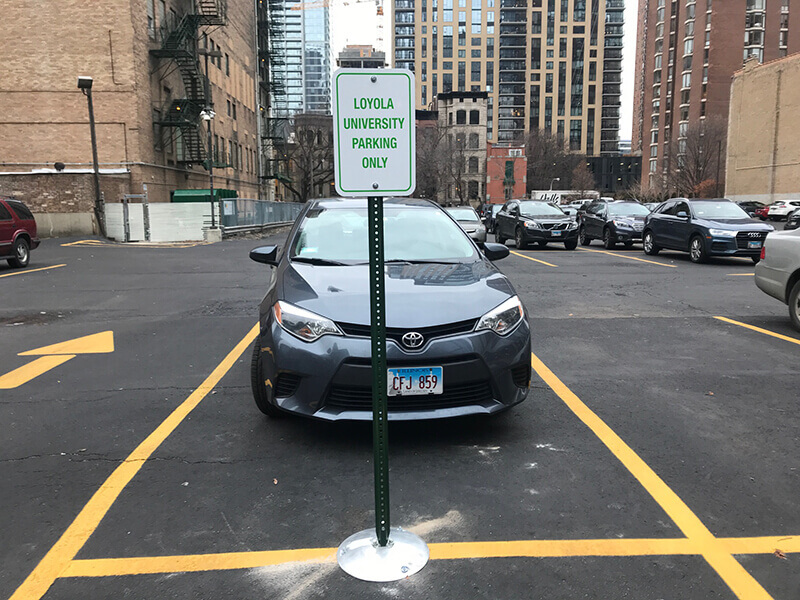 Loyola university parking signage on the parking lot