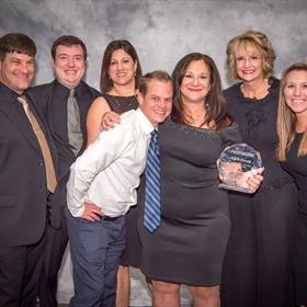 the team at fastsigns of central orlando receive an award