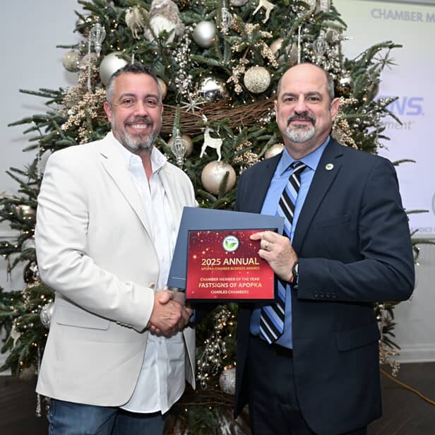 An image of Charles accepting the award.