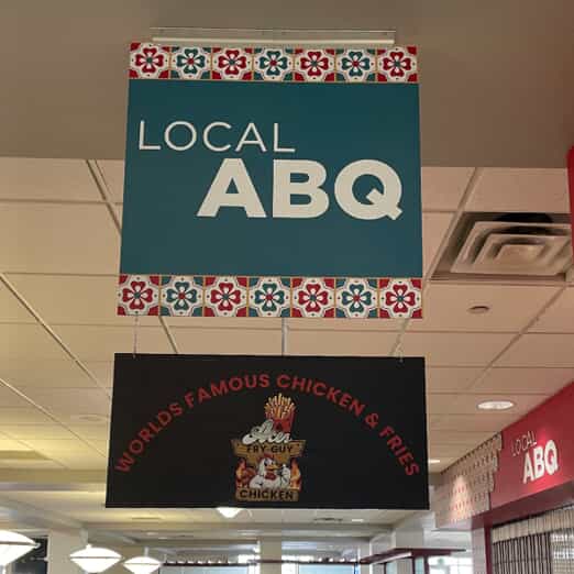 An image of two indoor hanging banners.