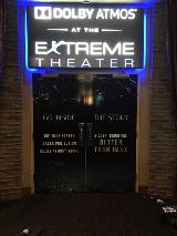 Extreme theater custom light up sign on the top of the door