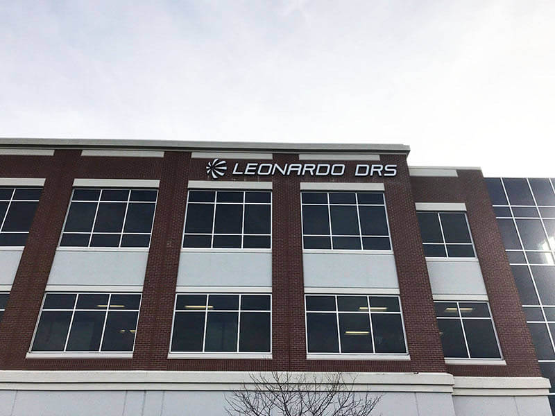 Leonard DRS logo on the red brick building