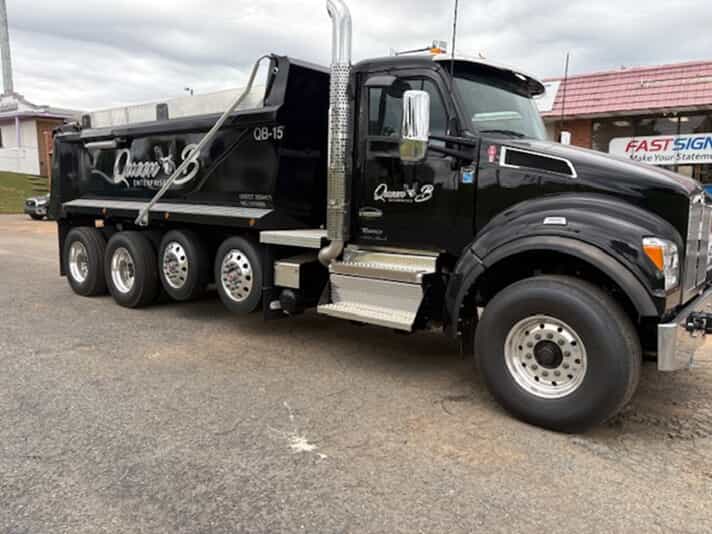 An image of vehicle graphics on a black truck.