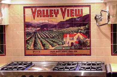 tiles on a kitchen wall show a scene above the stove