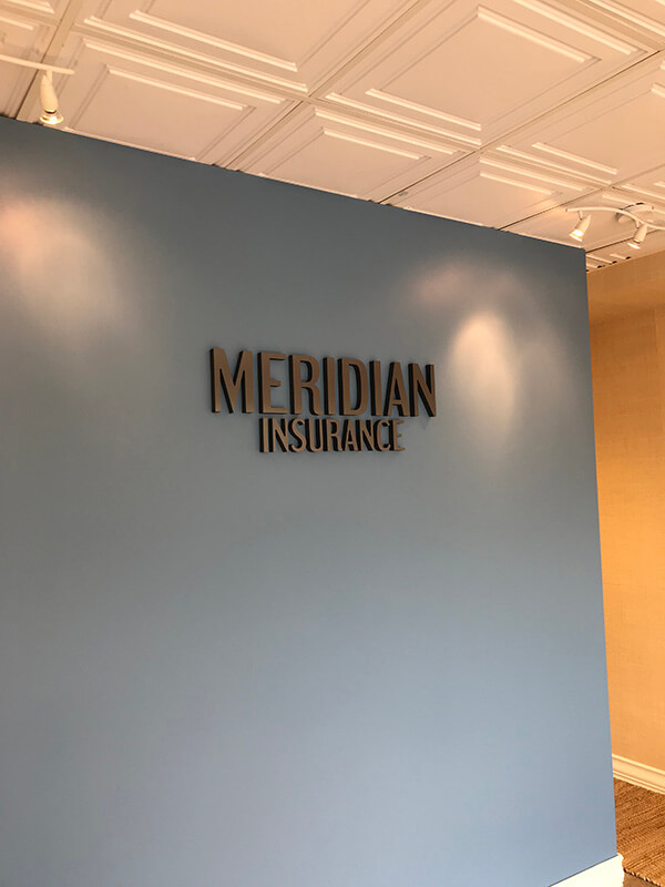 Meridian Insurance logo in the blue wall