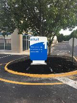 Wayfinding sign for intuit on the side of the road