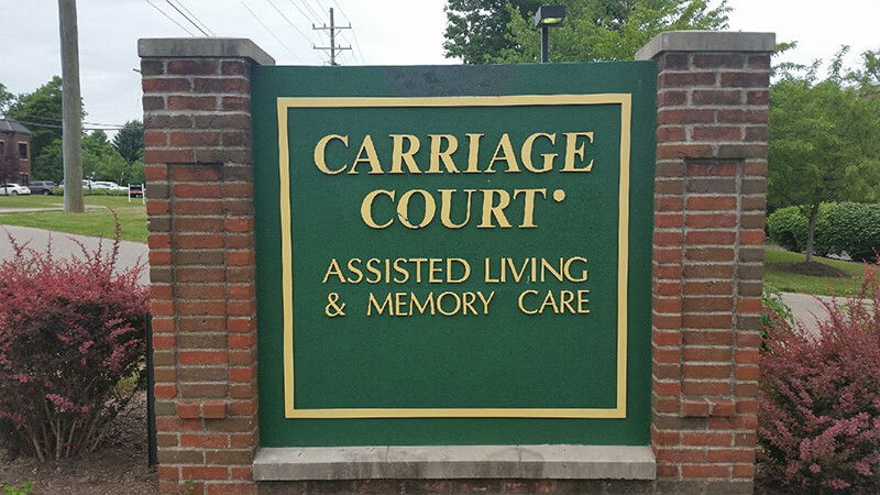 Carriage court outside signage with brick column design