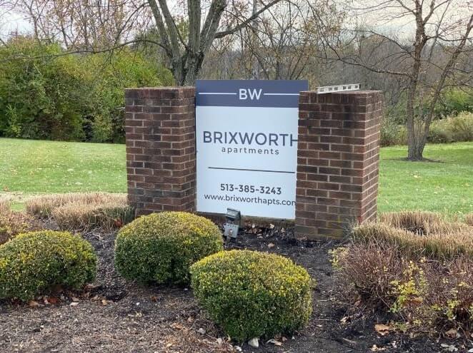 Brixworth apartments sign in the garden
