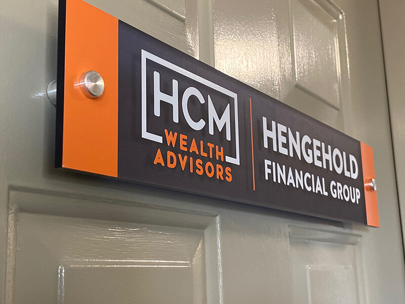 HCM Wealth Advisors custom decal on the white door