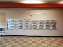 Kettle cuisine decal on the wall with lockers below