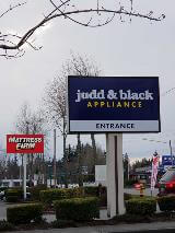 Judd & black appliance signage on the commercial lot