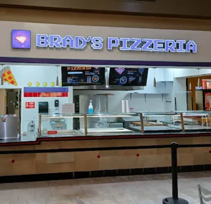 An image of the Brad's Pizzeria light up channel letters.