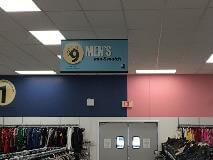 Men's mix & match sign on the store with clothes