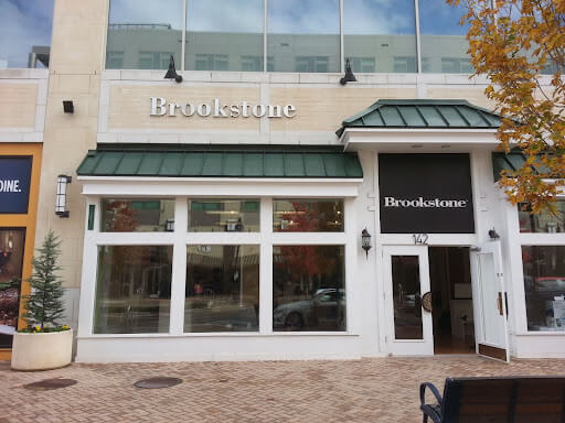 Brookstone channel sign on the building and on the door