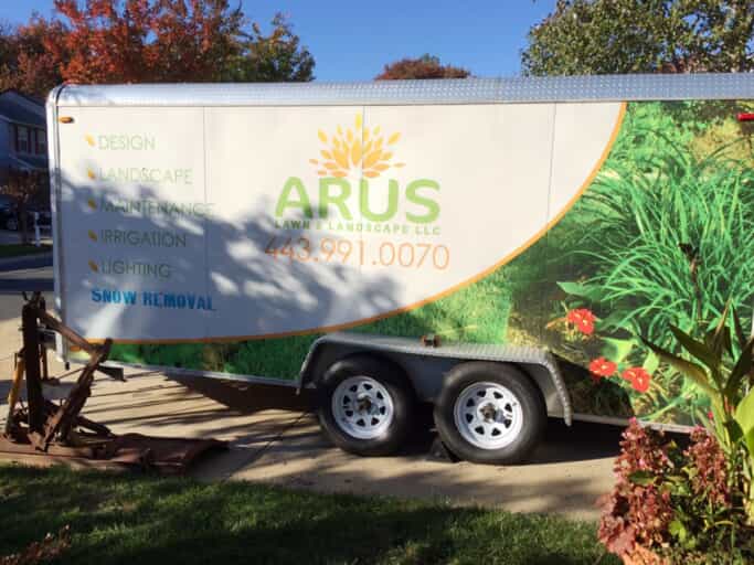 an Arus lawn landscaping truck