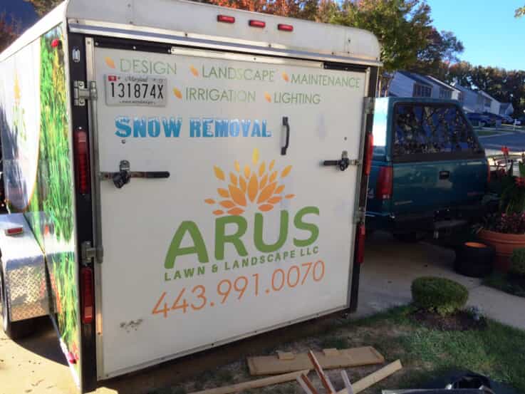 an Arus lawn landscaping truck