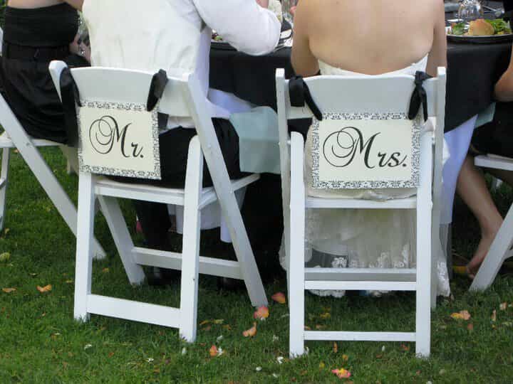 signage on wedding chairs