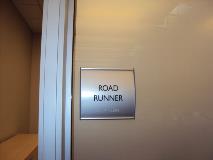 Med impact road runner sign on the wall