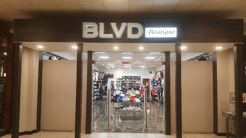 BLVD Boutique signage on the store with products inside