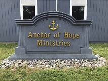 Color gray and gold Anchor of Hope monument signage