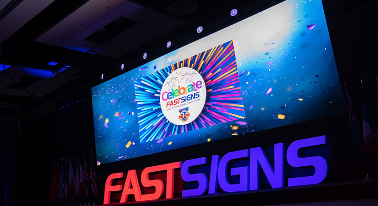 Local FASTSIGNS® Receives Mentor Recognition at International Convention