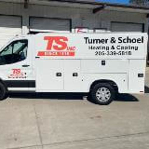 White truck with custom vehicle graphics