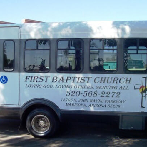 First Baptist Church white van with custom graphics