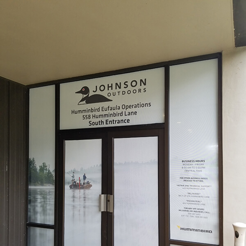 Johnson Outdoors Custom banner on the entrance door of the office