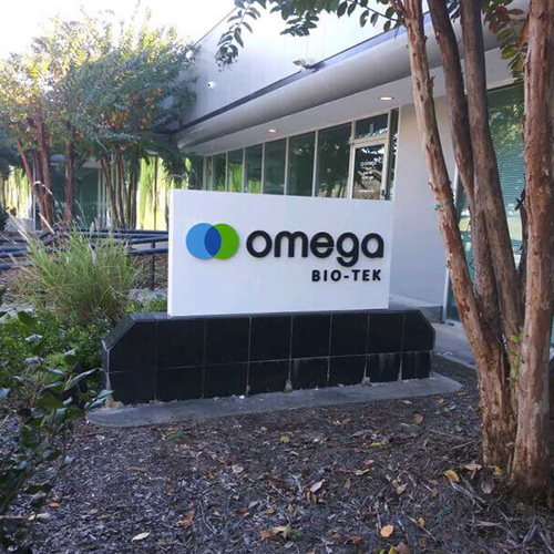 Omega Bio tek monument sign outside the office
