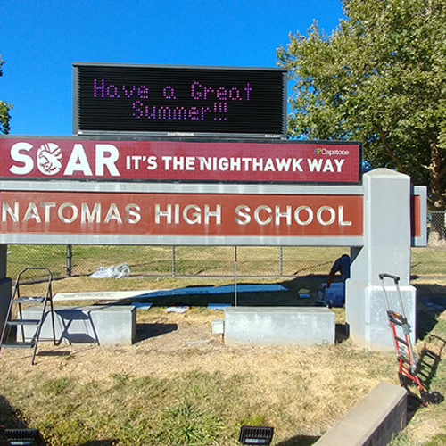 Natomas high school monument sign outside the campus