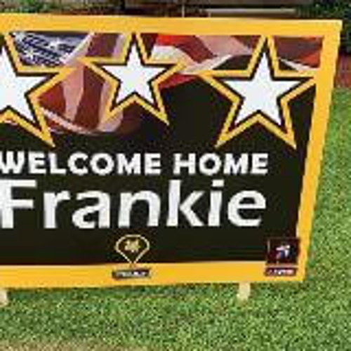 Welcome home frankie custom sign on the grass