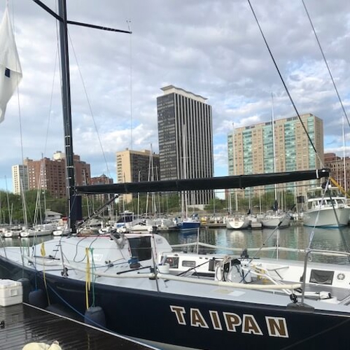 Boat Taipan lettering parked at the port