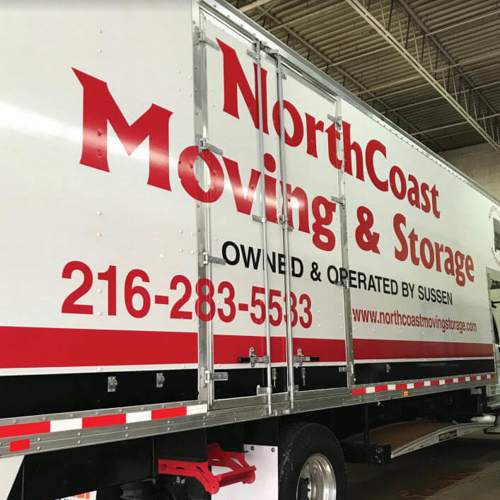 Northcoast Moving & Storage truck parked on the garage