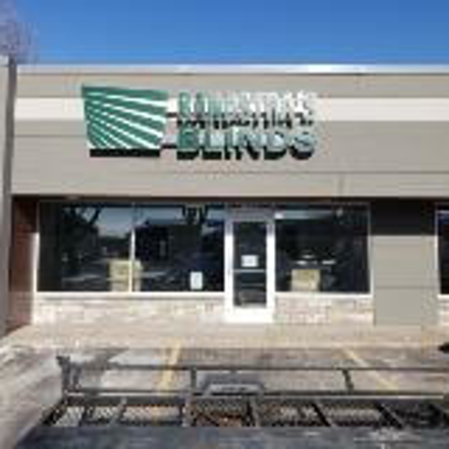 Green Bandstra's blinds signage on the building
